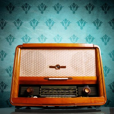 vintage radio on blue background