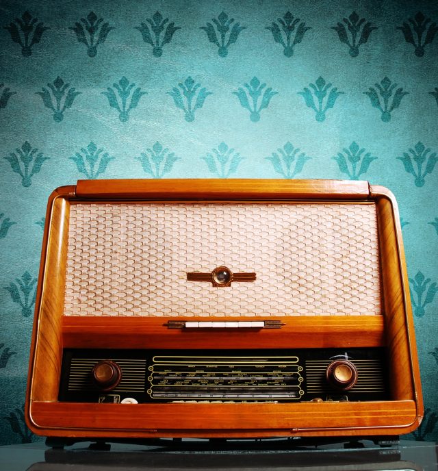 vintage radio on blue background